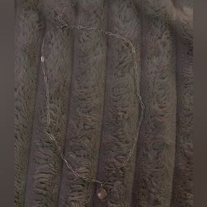 Silver necklace with pink gemstone pendant